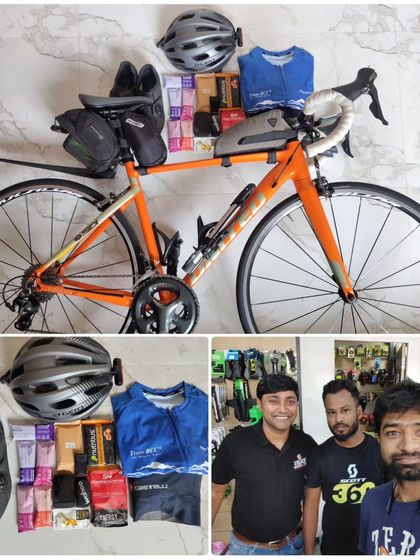 Preparation is key for any long distance ride. This image shows the gear layout for the Jog Falls 1000K BRM, including the bike, nutrition, clothing, and tools needed to tackle such an endurance event.