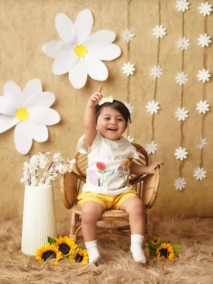 A moment of pure excitement as the little girl points up, her face lit up with a huge smile. These are the joyful, energetic moments we aim for.