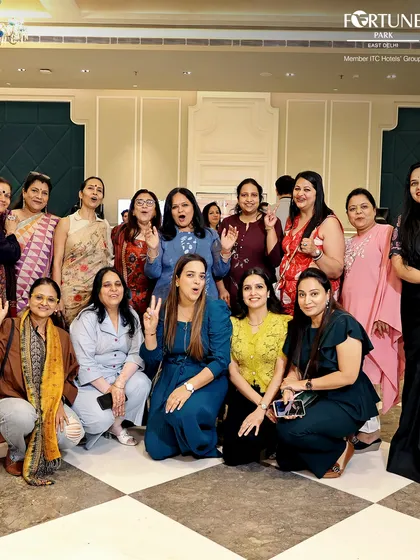 A joyful group photo from my Women's Day celebration. It was a day of empowerment and fun, and this image captures the wonderful spirit of community and togetherness that I aim to foster at my events.