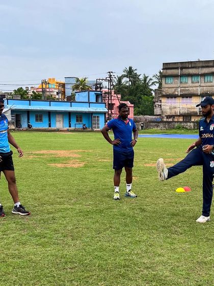 A light-hearted moment during a warm-up. Building a positive and enjoyable training environment is key to long-term success and consistency.