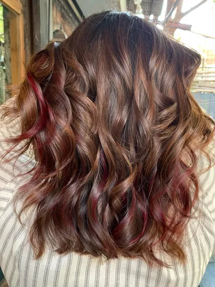 The back of the 'Spiced Brown Sugar Apple' hair, showing the beautiful blend of brown and red tones.