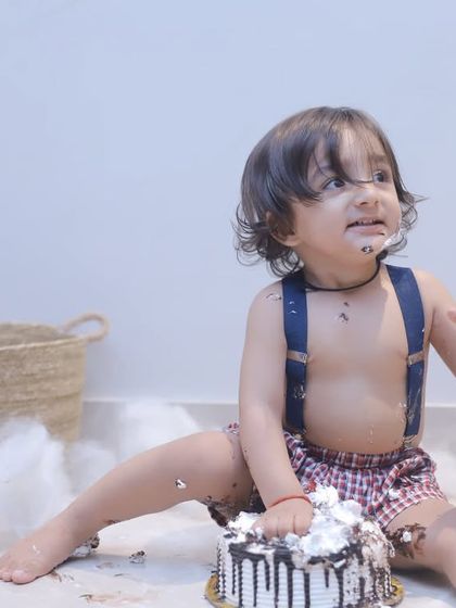 A duplicate of the cake smash scene, showing the consistent quality and fun we bring to every first birthday session.