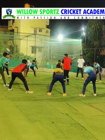 A night-time fitness session. Our training continues under lights, focusing on agility and teamwork drills.