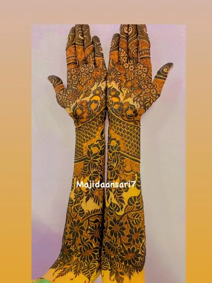 A complete view of a symmetrical bridal design, showing how the patterns match perfectly on both arms.