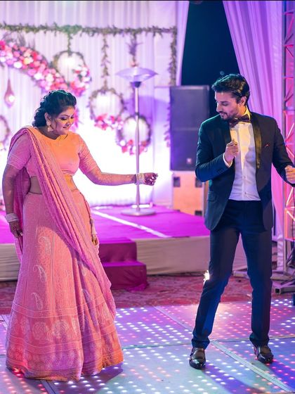 The couple showing off their dance moves at their reception. I love capturing the fun and energy of the party.