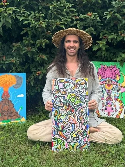 Adam Duke, a graduate of our 500-hour training, showcases some of the vibrant artwork created during his Art & Yoga retreat.
