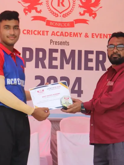 Another proud member of the RCA Capitals team receiving his certificate of participation.