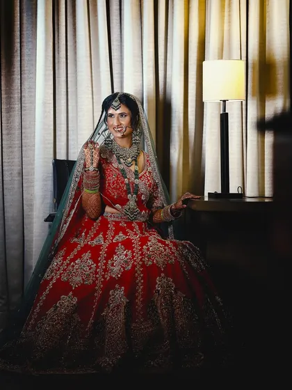 A thoughtful and elegant bridal portrait. I use creative lighting and posing to capture the bride's personality and grace on her big day.