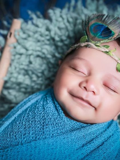 A precious smile captured during our Little Krishna themed session. These spontaneous moments of joy are what make each photoshoot so special.