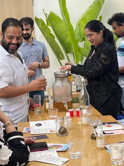 Here you can see the hands-on part of our kombucha class in action. Participants gather around to learn how to properly handle the SCOBY and start their first batch of fermented tea.