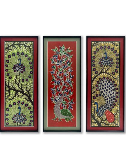 This beautiful triptych of peacock artworks is vibrantly enhanced by its framing. We used a combination of gray and red acid-free mats within a simple black metal frame to make the colors of the traditional art pop.