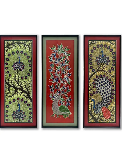This beautiful triptych of peacock artworks is vibrantly enhanced by its framing. We used a combination of gray and red acid-free mats within a simple black metal frame to make the colors of the traditional art pop.