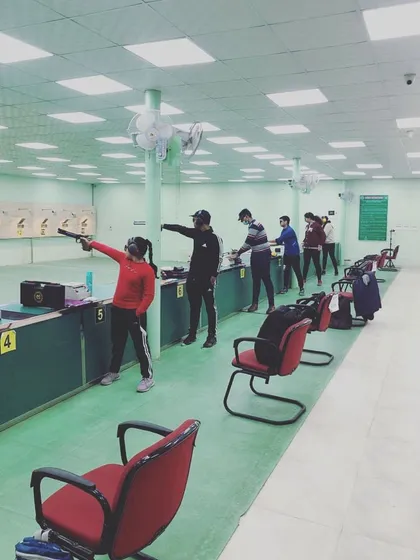 A typical day of practice at the Siri Fort Shooting Range. You can see a full line of my students, each focused on their target, building the discipline that marksmanship requires.