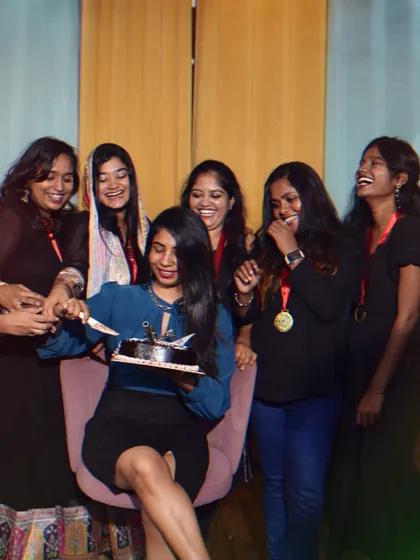 Sharing a laugh and some cake with my newly graduated students.