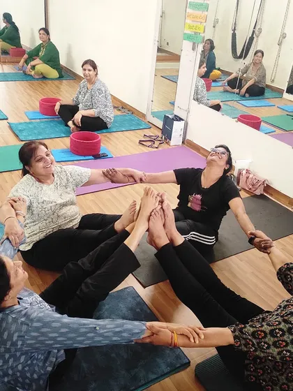 Partner yoga is not just about difficult poses, it is also about connection and having fun. This group exercise focuses on teamwork and shared balance, creating a supportive and playful environment in my Rohini studio. It is a great way to start or end a class.