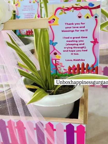 A detailed shot of the personalized card and the healthy plant, making for a meaningful and sustainable thank you gift.