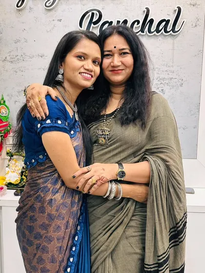 Another cherished photo with my mentor. Her humility and dedication have taught me as much as her artistic skills.