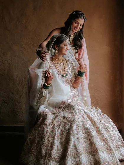A beautiful moment between sisters. I did the makeup for both the bride, Ruchamanee, and her sister, creating complementary looks that were perfect for the wedding day.