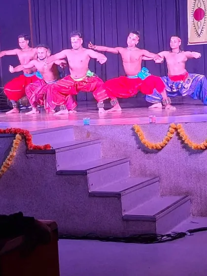 My students in a synchronized formation during a performance. The discipline and teamwork learned in the studio culminate in these powerful moments on stage.