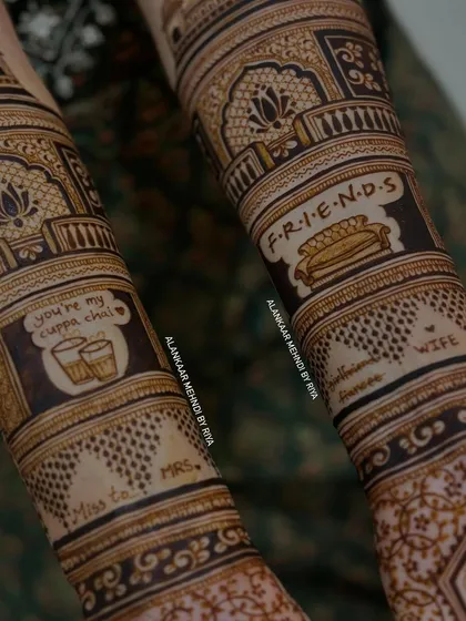 I love it when couples bring their unique stories to me. This design was for a bride and groom who are huge fans of the show 'FRIENDS' and share a love for chai, so we incorporated the iconic sofa and tea cups into their bridal henna.