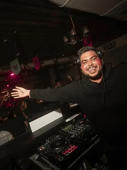 Arms open wide, embracing the energy of a packed house. This is my invitation for everyone to join the party.
