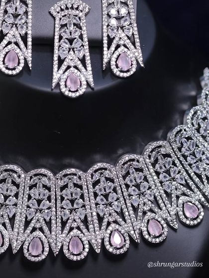A detailed view showing the quality of the American diamonds and the beautiful pastel pink stones.