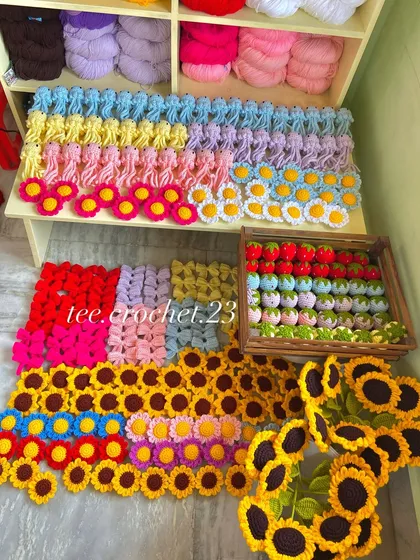 Another angle of the massive amigurumi and keychain order, showcasing the vibrant colors.