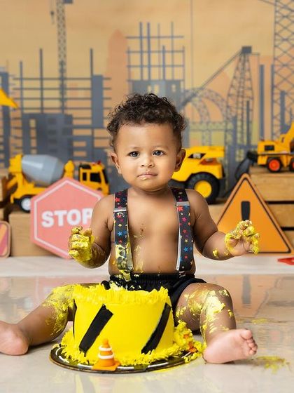 Work in progress: turning one! This construction-themed cake smash, with toy trucks and a custom cake, was so much fun to put together for this little builder's big day.