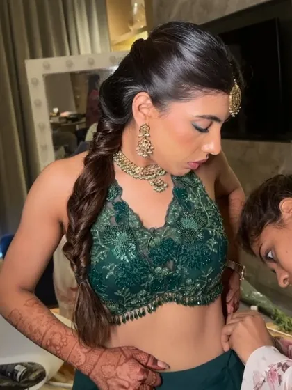 A behind the scenes shot of me perfecting the braid. I always make sure every detail is just right before the client steps out.