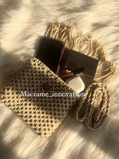This shot shows you how much you can fit inside one of my macrame sling bags. It's perfect for your phone, makeup, and earbuds.