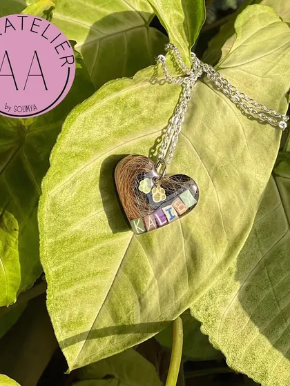 Our furry friends are family, and their memories deserve to be cherished. I preserved a lock of a beloved pet's hair in this heart-shaped resin pendant, creating a touching memorial piece to keep them close forever.