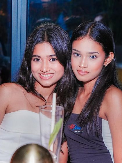 Two friends posing for a photo.