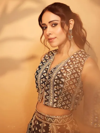 For the Chhorii 2 announcement, I styled Nushrratt Bharuccha in this custom SVA Couture lehenga. The geometric mirror work gives a modern edge to the traditional ghagra choli silhouette.