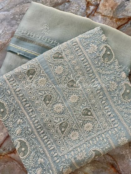 A flat-lay of the powder blue kurta and its coordinated dupatta.