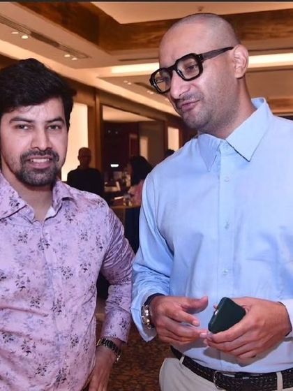 A candid shot with former Justice Chandramauli Kumar Prasad and a colleague.