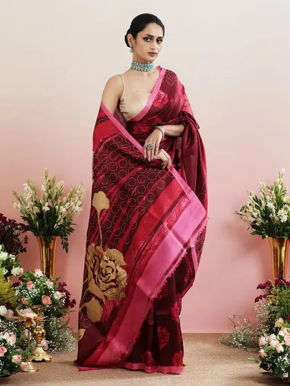 Another full view of the maroon floral saree, a statement piece for any wedding season event.