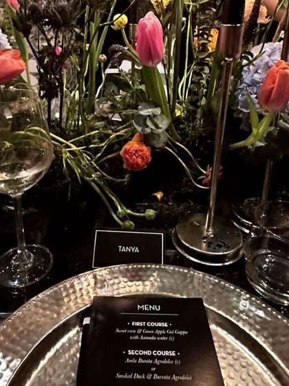 A personalized place setting with a custom menu for a guest named Tanya. We believe in making every guest feel special at our private dinners.