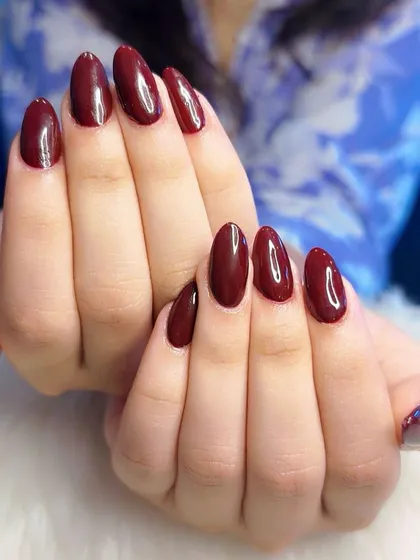Another view of the timeless deep red polish.