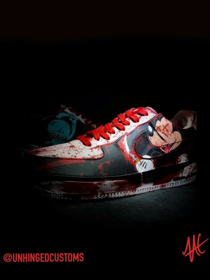 Another angle of the unhinged Mickey. The blood splatter even covers the midsole and outsole for a fully immersive design.