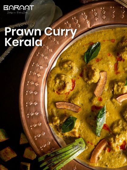 A beautiful copper bowl of my Prawn Curry Kerala, showcasing the rich and creamy texture of the gravy.