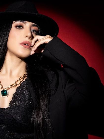 A powerful editorial look created for a pro makeup class demonstration. The sharp contouring, bold brow, and dramatic lighting come together to create a high-fashion, moody image suitable for a brand campaign.