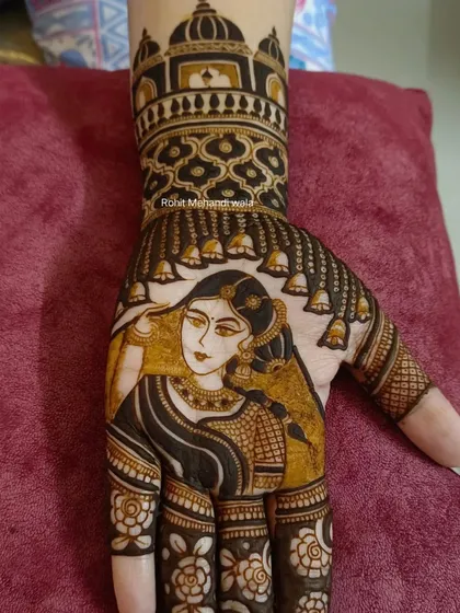 A detailed close-up of a single hand portrait. Notice the fine lines in the jewelry, the shading on the face, and the delicate ghungroo (bells) hanging from the architectural dome border.