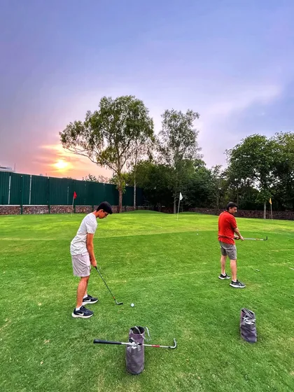 Drive for show, putt for dough. The work continues on the putting green, where you can dial in your short game as the sun sets.