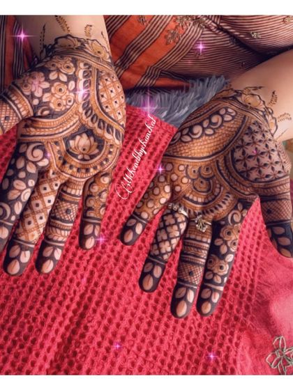 A lovely floral design for Karwachauth, with lotus motifs and intricate fillers.