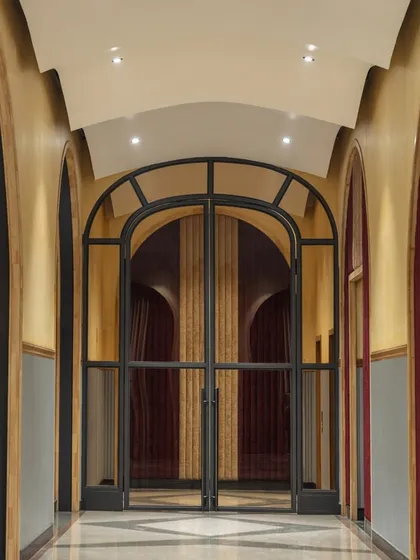 The entrance corridor at Nishtara features a series of grand arches, guiding guests into the main hall. The design draws from Gothic and Romanesque influences, creating a sense of anticipation and drama from the moment of arrival.
