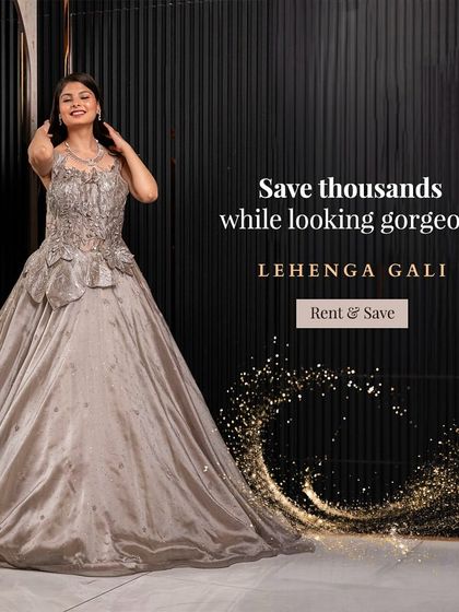 Save thousands while looking gorgeous in this grey peplum-style ball gown. The unique silhouette and intricate embroidery offer a high-end designer look at a rental price.