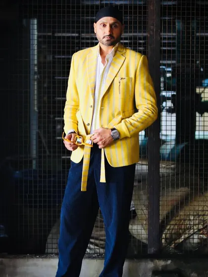 A powerful portrait of Harbhajan Singh in the custom ZOOP blazer. This image captures the distinctive craft and dapper style that defines my bespoke work.