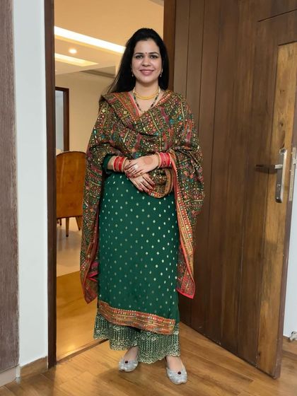 This green Banarasi suit is one of my all-time favorites for Karwa Chauth. The color is so auspicious and the fabric feels so luxurious. It's a timeless piece that I will cherish for years.