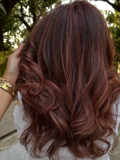 More of the 'Cowboy Copper' trend that I'm loving. This rich, warm red-brown shade is so flattering and gives the hair an incredible vibrancy and shine. I always use K18 to keep the hair healthy during the process.