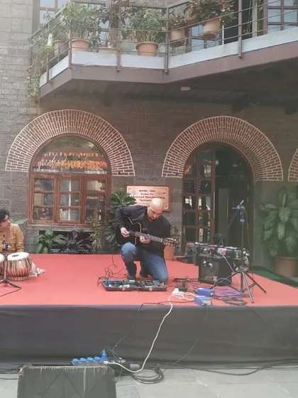 An impromptu guest performance at the College of Engineering, Pune. Here I am jamming with a guitarist on stage.